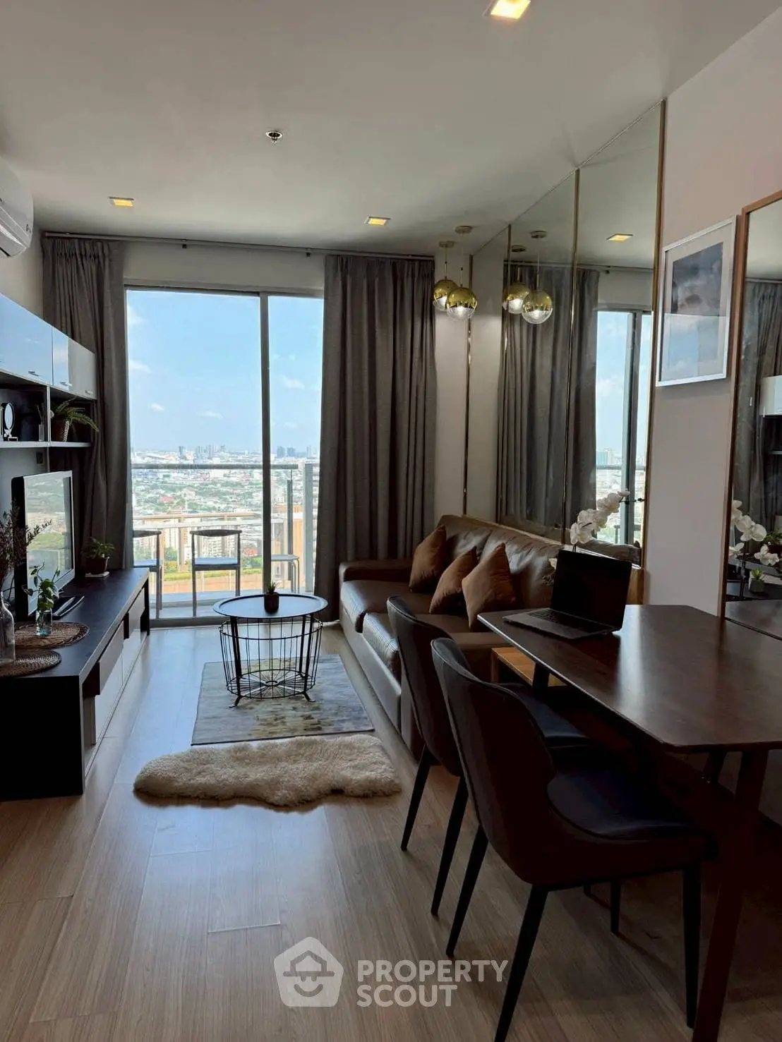 Stylish modern living room with city view and elegant decor