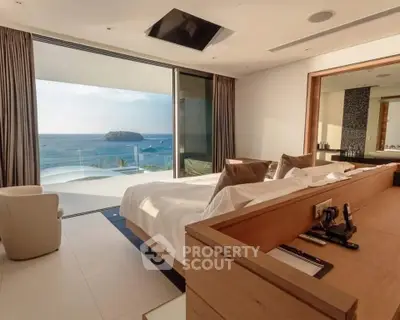 Luxurious bedroom with stunning ocean view and modern decor