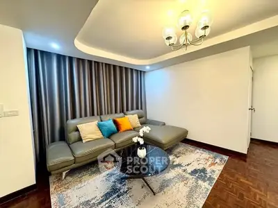 Modern living room with stylish sofa and elegant lighting