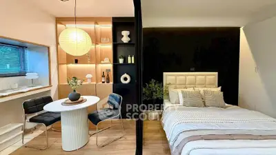 Stylish modern bedroom with cozy dining nook and elegant decor