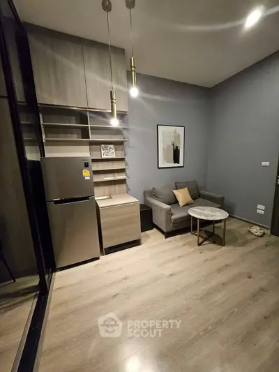 Modern living room with sleek furniture and stylish lighting