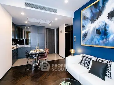 Modern living room with elegant decor and open kitchen layout