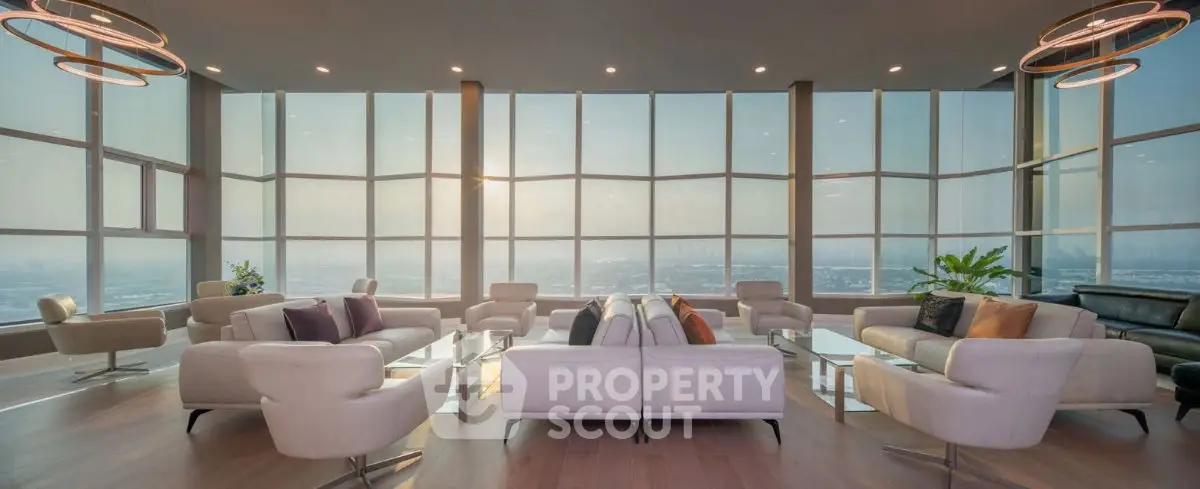 Luxurious penthouse living room with panoramic city views and elegant modern furniture.