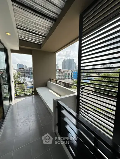 Modern balcony with city view and stylish railing design