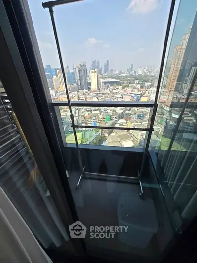 Stunning cityscape view from a high-rise balcony, perfect for urban living enthusiasts.