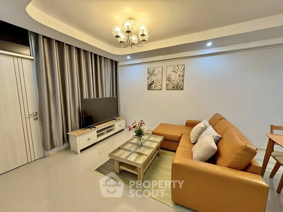 Modern living room with elegant lighting and cozy leather sofa