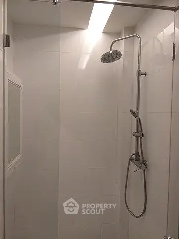 Modern bathroom shower with sleek design and overhead rain showerhead