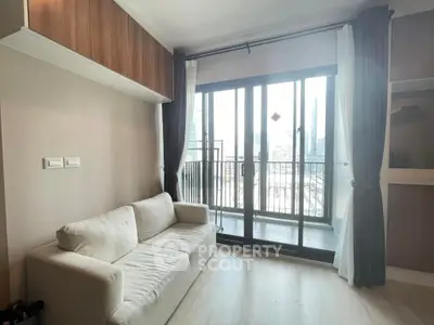 Modern living room with city view balcony and cozy sofa in high-rise apartment