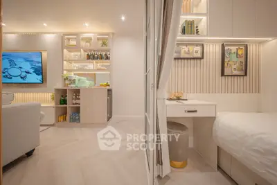 Modern living room with stylish bar and cozy bedroom corner