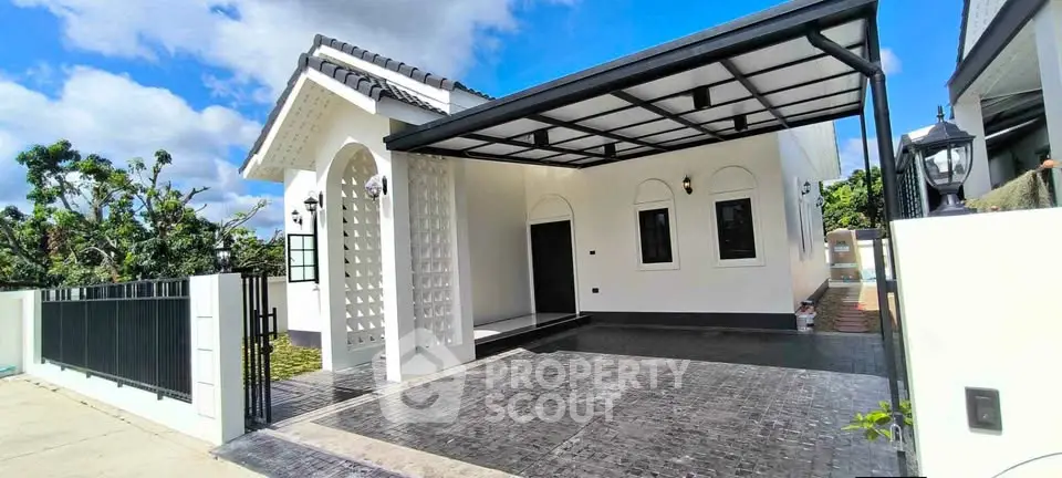 Charming modern house with spacious carport and elegant exterior design, perfect for family living.