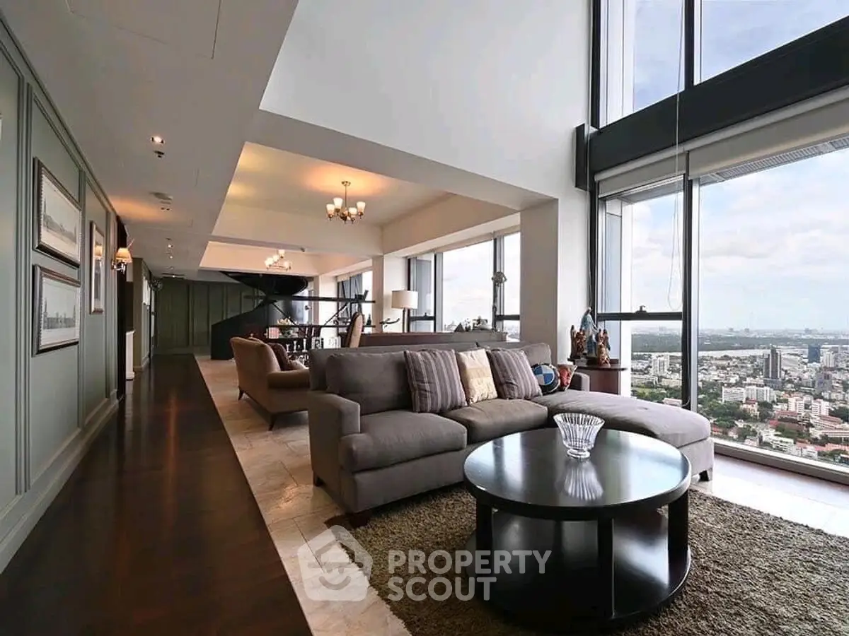 Luxurious living room with panoramic city views and elegant decor