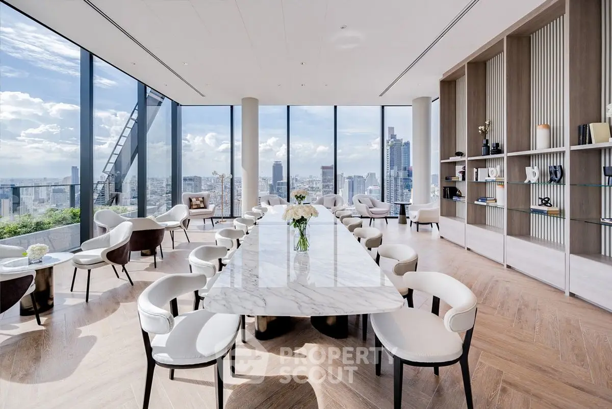 Luxurious penthouse with panoramic city views and elegant marble dining table.