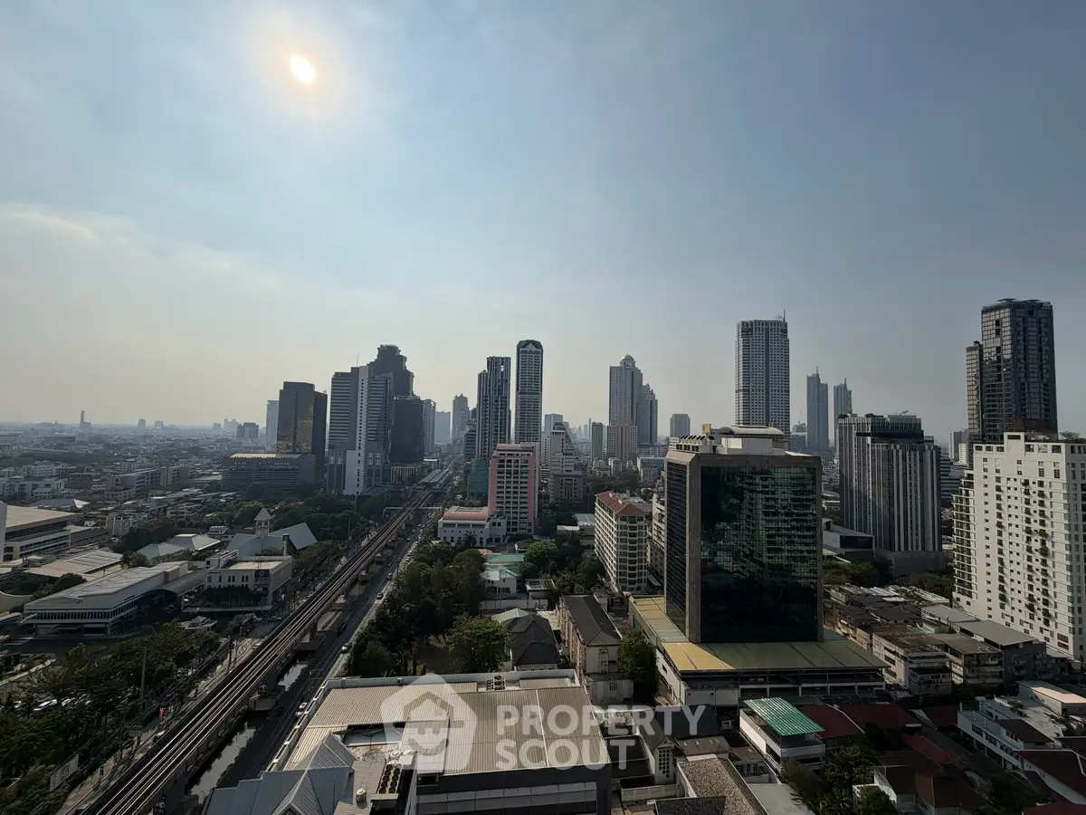 Stunning cityscape view showcasing modern skyscrapers and urban landscape under a clear sky.