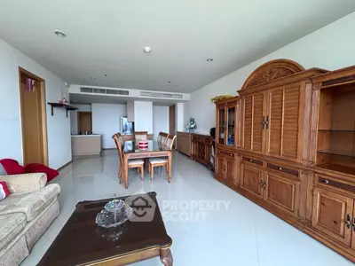 Spacious living room with elegant wooden furniture and modern decor