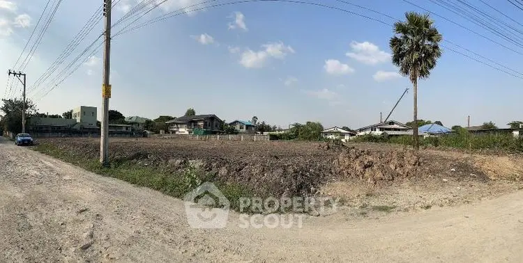 Expansive vacant land plot with potential for development in a serene neighborhood.