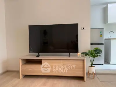 Modern living room with sleek TV stand and minimalist decor