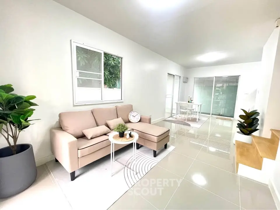 Modern living room with sleek furniture and natural light