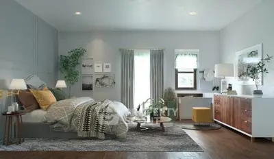 Spacious and stylish bedroom with modern decor and natural light