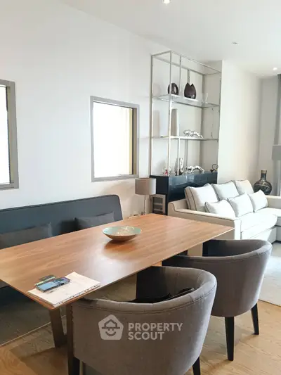 Modern living room with elegant dining area and stylish decor