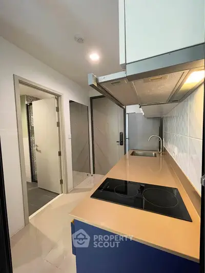 Modern kitchen with sleek design and electric stove