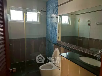 Modern bathroom with glass shower and sleek design