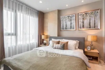 Elegant bedroom with large window and stylish decor
