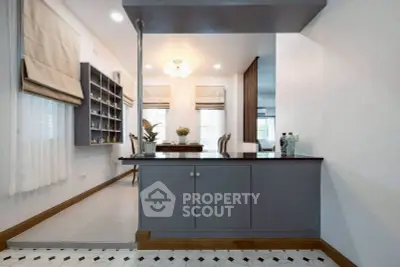 Elegant kitchen with open layout and modern cabinetry