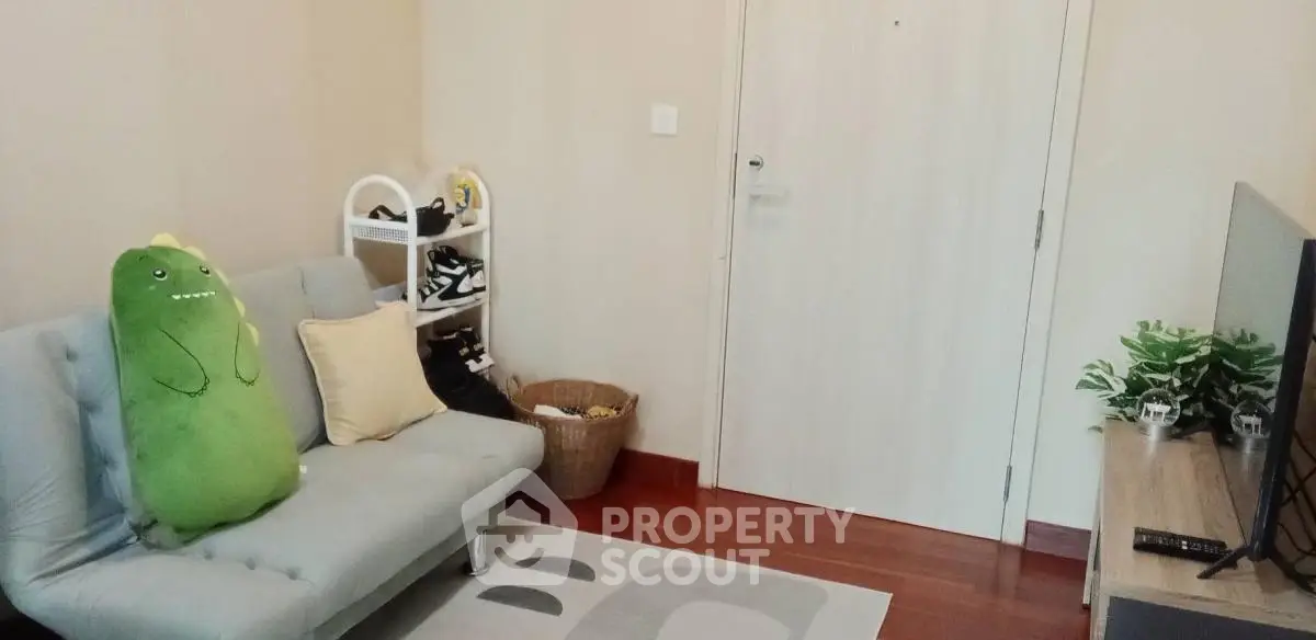 Cozy living room with modern decor and plush seating