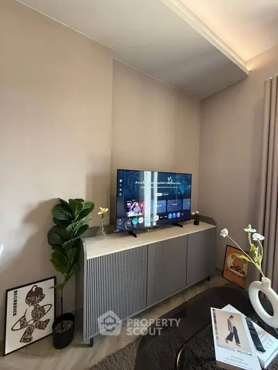 Modern living room with stylish TV setup and elegant decor