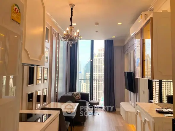 Luxurious high-rise living room with stunning city view and elegant chandelier.