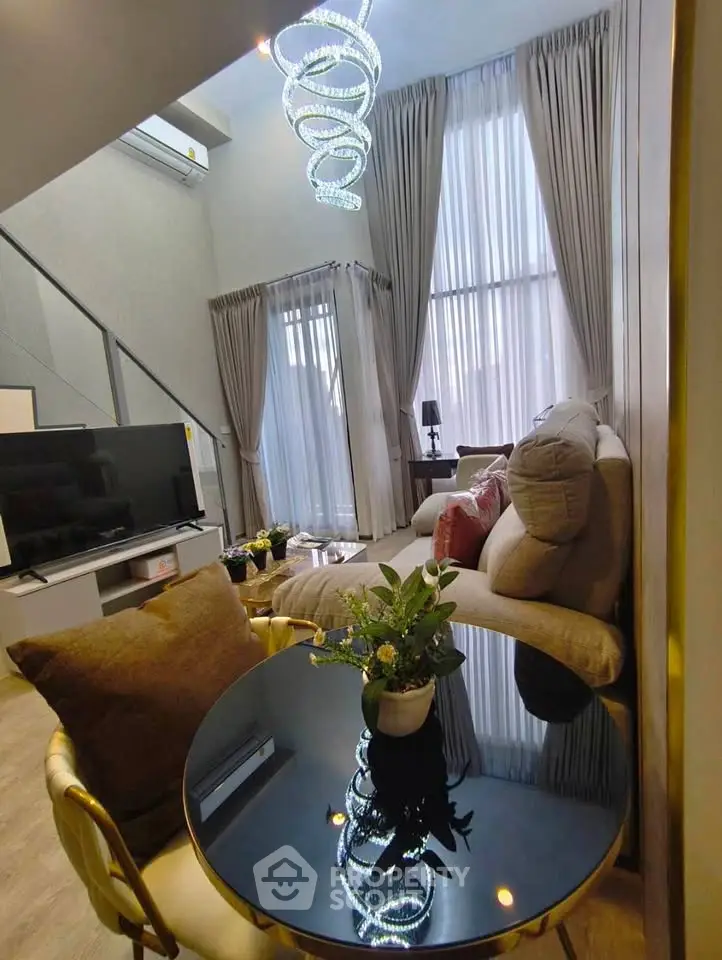 Luxurious modern living room with high ceilings and elegant decor