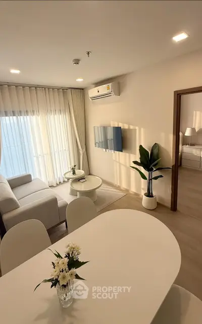 Modern living room with elegant decor and natural light