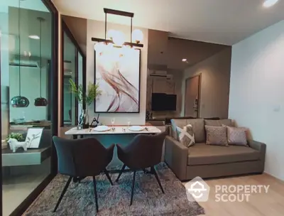 Modern living room with stylish decor, cozy seating, and elegant dining area, perfect for entertaining guests.