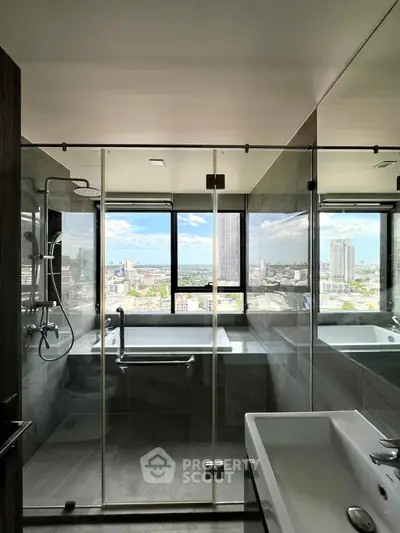 Luxurious bathroom with stunning city view from high-rise apartment