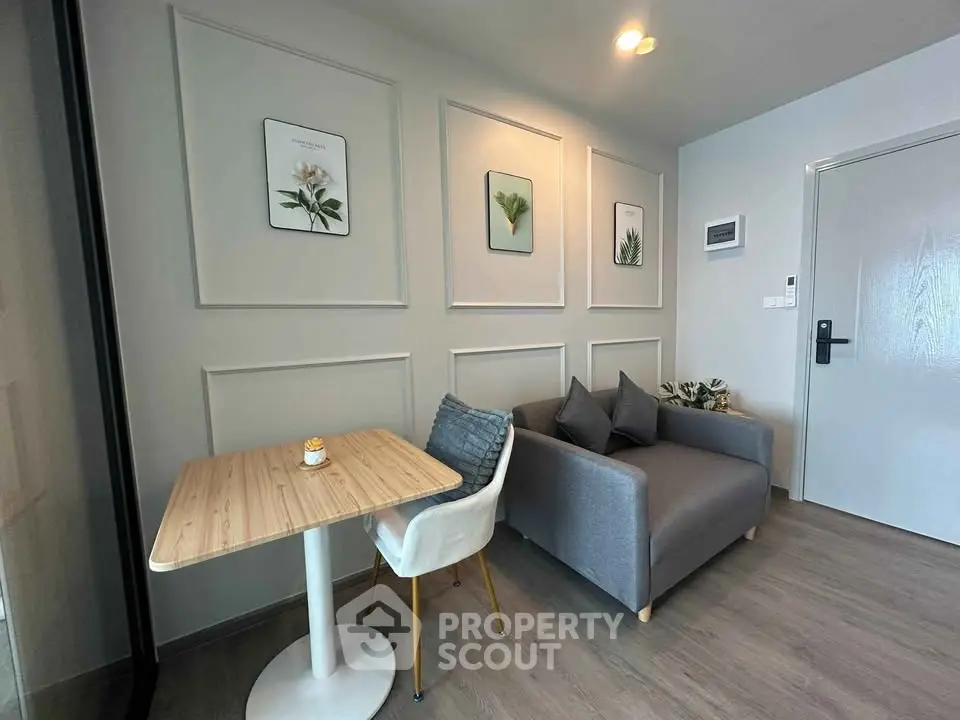 Modern living room with stylish decor and cozy seating area, perfect for relaxation and entertaining.