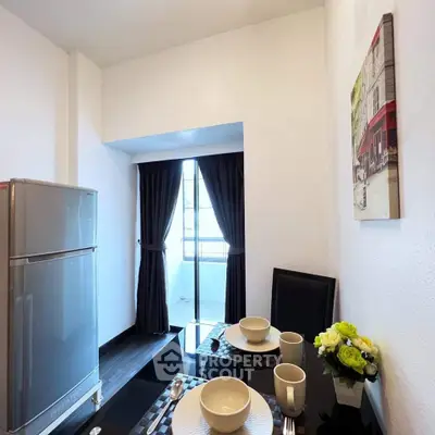 Modern kitchen with sleek dining setup and natural light