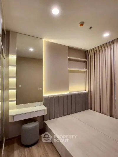 Modern bedroom with built-in lighting and elegant decor