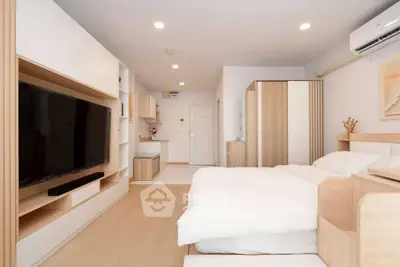 Modern studio apartment with sleek design and cozy ambiance