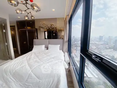 Luxurious bedroom with panoramic city view and modern decor