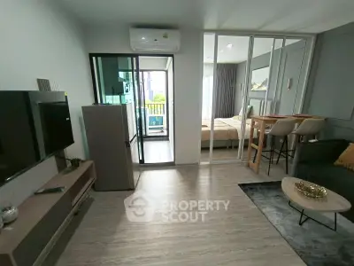 Modern living room with open layout and balcony view