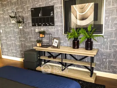 Stylish bedroom with nautical-themed wallpaper and modern decor