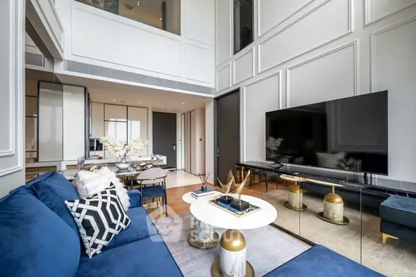 Luxurious modern living room with high ceilings and elegant decor