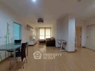 Spacious living room with modern furniture and natural light