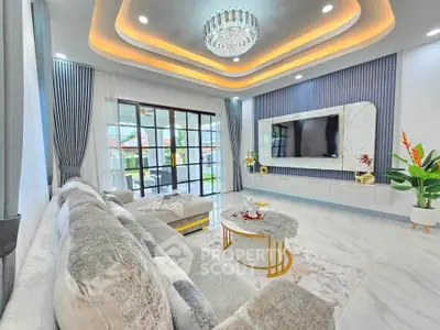 Luxurious modern living room with elegant chandelier and stylish decor