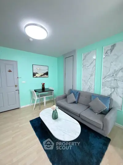 Chic modern living room with stylish decor and cozy seating area, perfect for relaxation and entertaining.