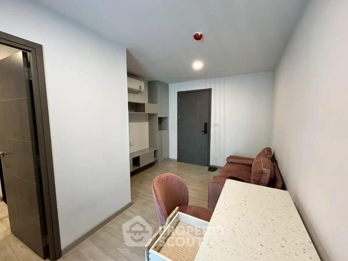 Modern living room with stylish furniture and sleek design in a contemporary apartment.