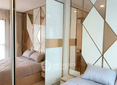 Luxurious modern bedroom with mirrored wardrobe and elegant decor
