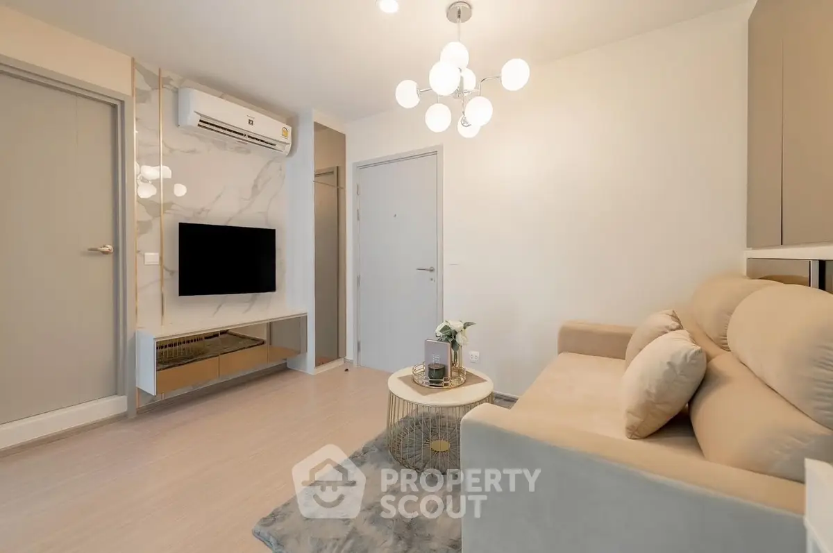 Modern living room with stylish decor and elegant lighting