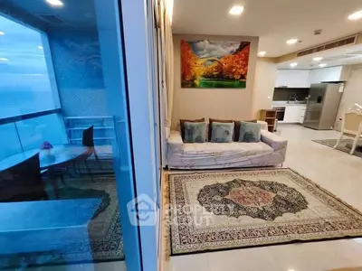 Luxurious living room with elegant decor and open kitchen layout