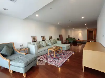 Spacious living room with elegant furniture and wooden flooring